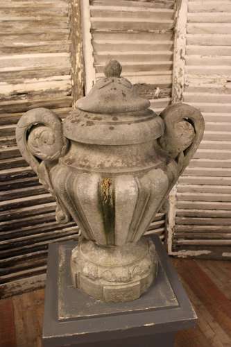 PAIR OF CARVED STONE LIDDED URNS