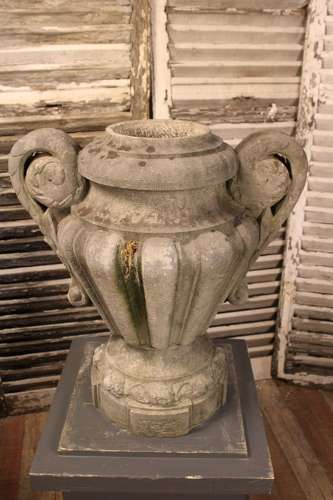 PAIR OF CARVED STONE LIDDED URNS