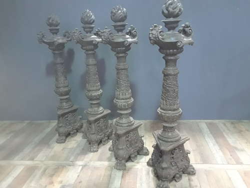 FOUR ITALIAN IRON TORCHIERES