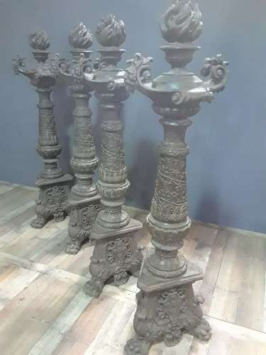 FOUR ITALIAN IRON TORCHIERES