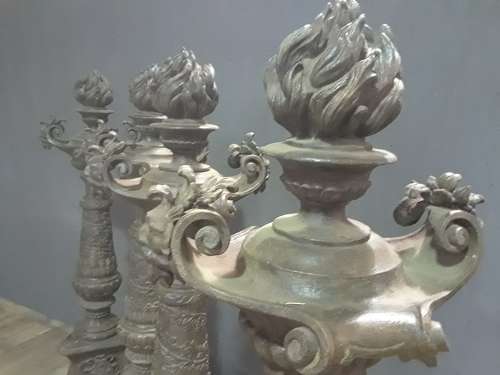 FOUR ITALIAN IRON TORCHIERES