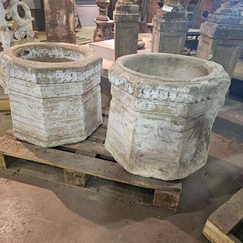 PAIR OF CARVED STONE WELL HEADS
