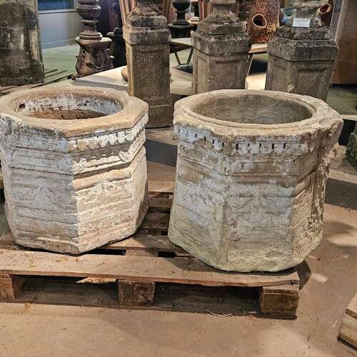 PAIR OF CARVED STONE WELL HEADS