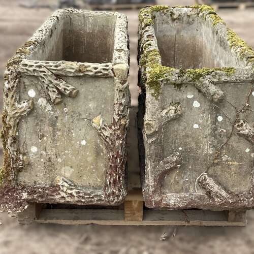 PAIR OF EXCEPTIONALLY LARGE FAUX BOIS PLANTERS