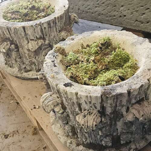 PAIR OF ENGLISH RECONSTITUTED STONE PLANTERS IN THE FORM OF CAPITALS