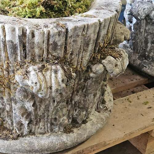 PAIR OF ENGLISH RECONSTITUTED STONE PLANTERS IN THE FORM OF CAPITALS