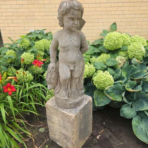 STATUE OF A YOUNG HUNTER WITH HIS DOG