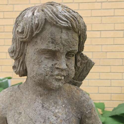 STATUE OF A YOUNG HUNTER WITH HIS DOG