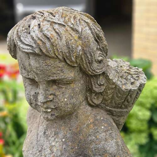 STATUE OF A YOUNG HUNTER WITH HIS DOG
